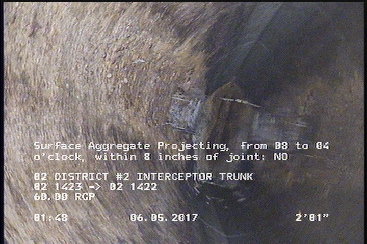Surface Aggregate Projecting, from 08 to 04 o'clock, within 8 inches of joint: NO