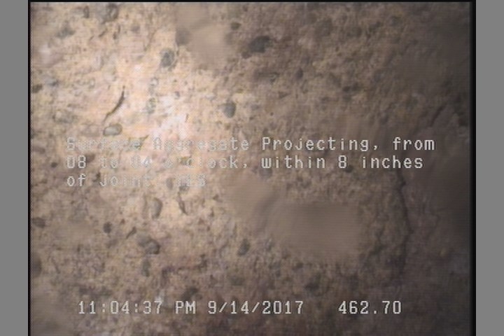 Surface Aggregate Projecting, from 08 to 04 o'clock, within 8 inches of joint: YES