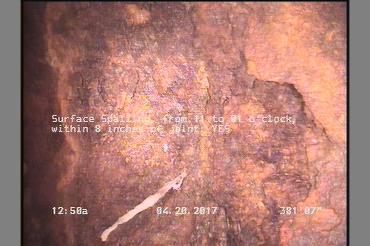 Surface Spalling, from 11 to 01 o'clock, within 8 inches of joint: YES
