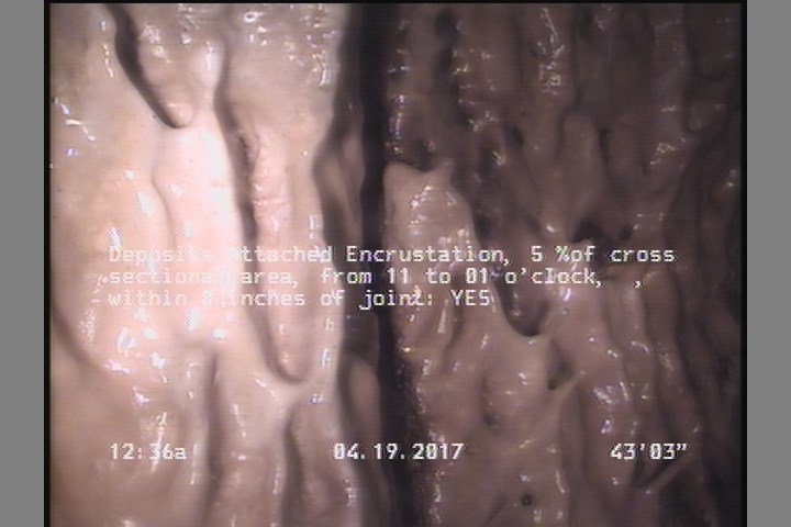Deposits Attached Encrustation, 5 %of cross sectional area, from 11 to 01 o'clock, , within 8 inches of joint: YES