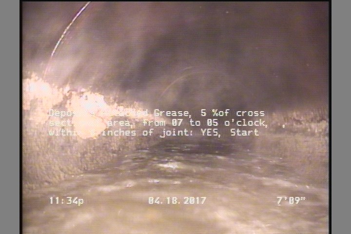 Deposits Attached Grease, 5 %of cross sectional area, from 07 to 05 o'clock, , within 8 inches of joint: YES, Start