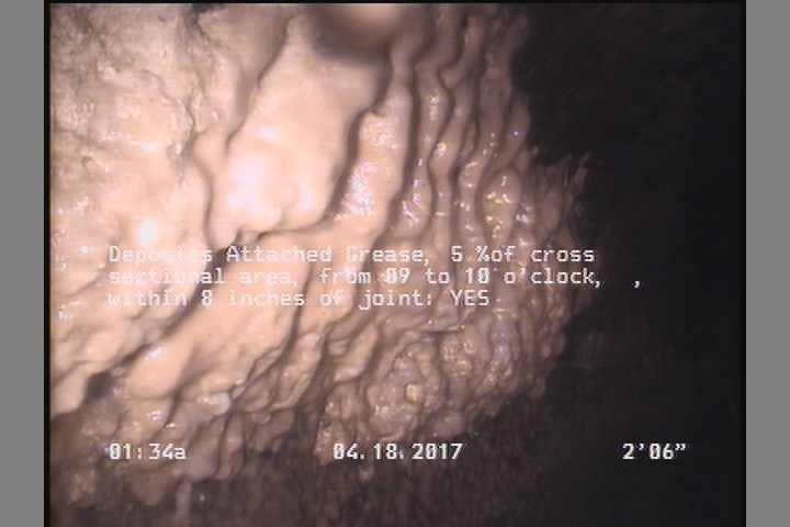 Deposits Attached Grease, 5 %of cross sectional area, from 09 to 10 o'clock, , within 8 inches of joint: YES