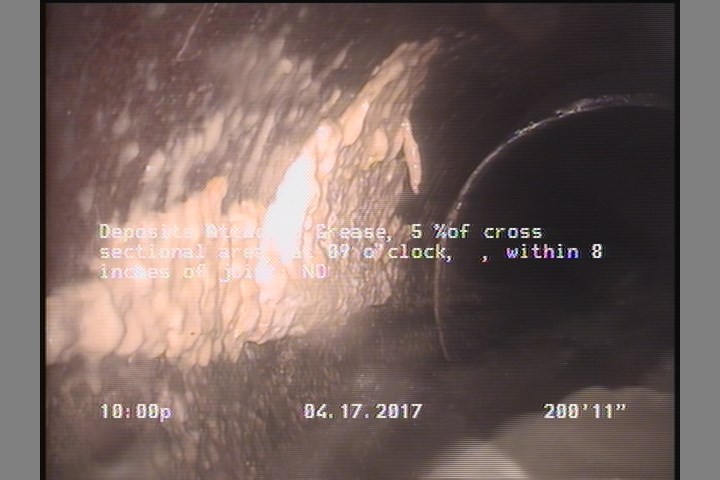 Deposits Attached Grease, 5 %of cross sectional area, at 09 o'clock, , within 8 inches of joint: NO