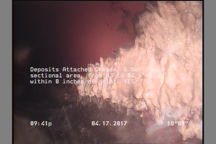 Deposits Attached Grease, 5 %of cross sectional area, from 03 to 04 o'clock, , within 8 inches of joint: YES