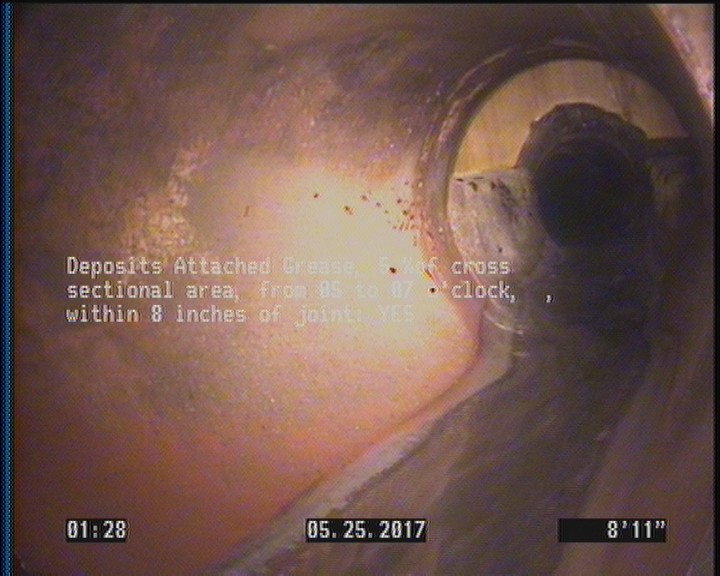 Deposits Attached Grease, 5 %of cross sectional area, from 05 to 07 o'clock, , within 8 inches of joint: YES
