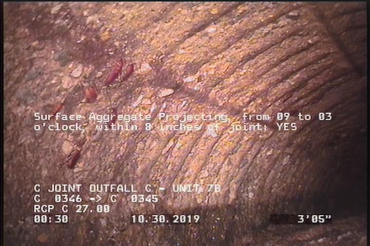 Surface Aggregate Projecting, from 09 to 03 o'clock, within 8 inches of joint: YES
