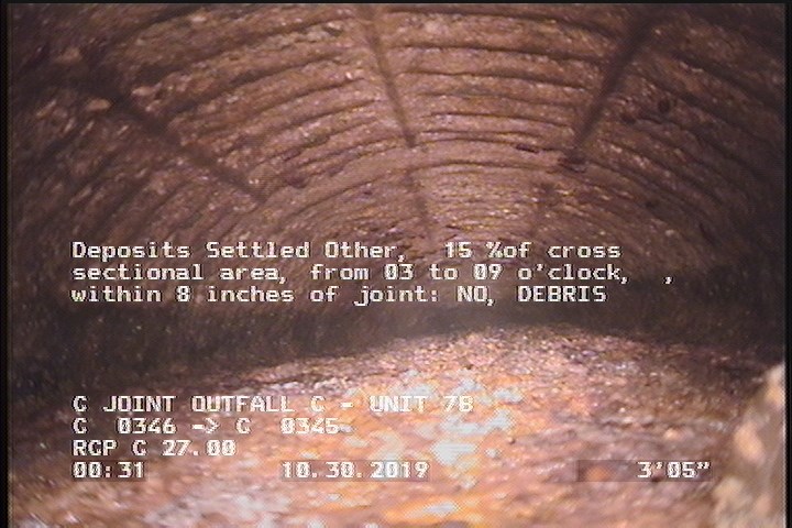 Deposits Settled Other, 15 %of cross sectional area, from 03 to 09 o'clock, , within 8 inches of joint: NO - DEBRIS