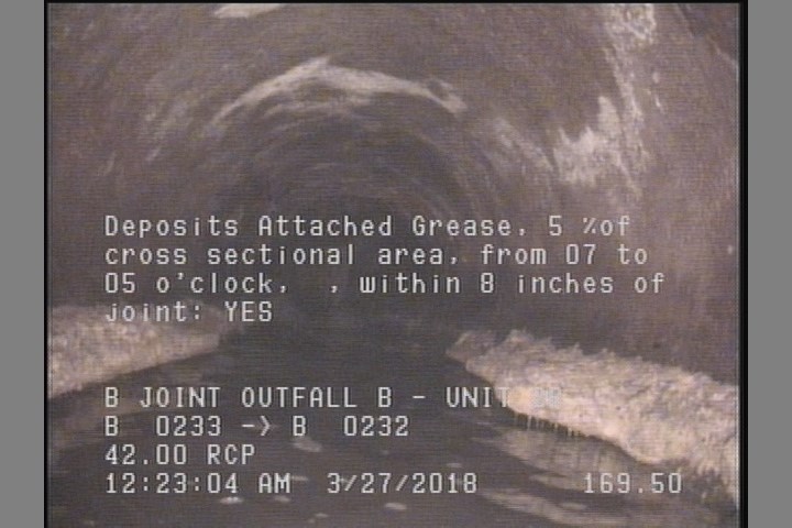Deposits Attached Grease, 5 %of cross sectional area, from 07 to 05 o'clock, , within 8 inches of joint: YES