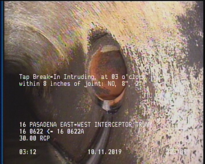 Tap Break-In Intruding, at 03 o'clock, -, #v, within 8 inches of joint: NO, 8", 2" - ACTIVE