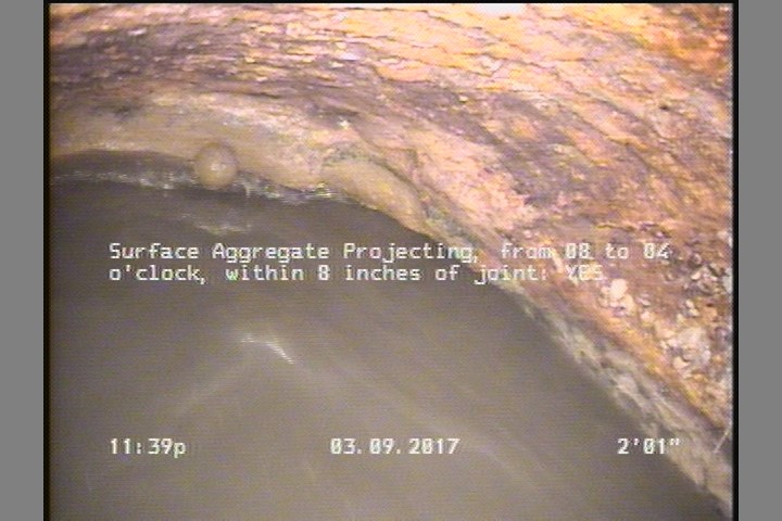 Surface Aggregate Projecting, from 08 to 04 o'clock, within 8 inches of joint: YES