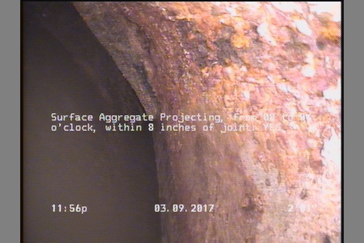 Surface Aggregate Projecting, from 08 to 04 o'clock, within 8 inches of joint: YES