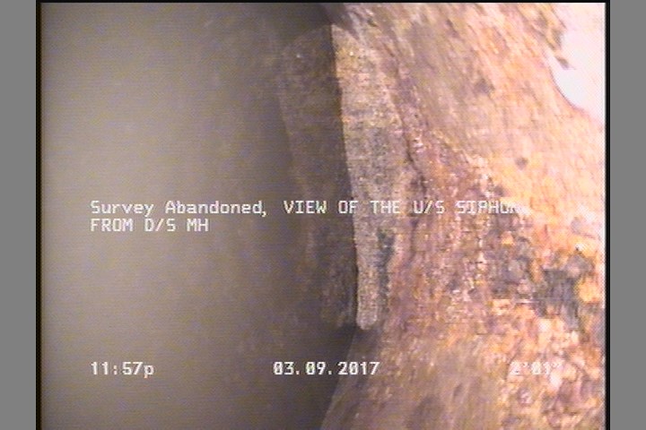 Survey Abandoned - VIEW OF THE U/S SIPHON FROM D/S MH