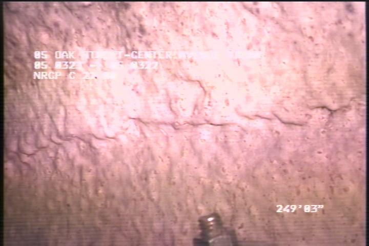 Surface Spalling, from 07 to 05 o'clock, within 8 inches of joint: NO - PEELING CONCRETE UNDER MAQG COAQT