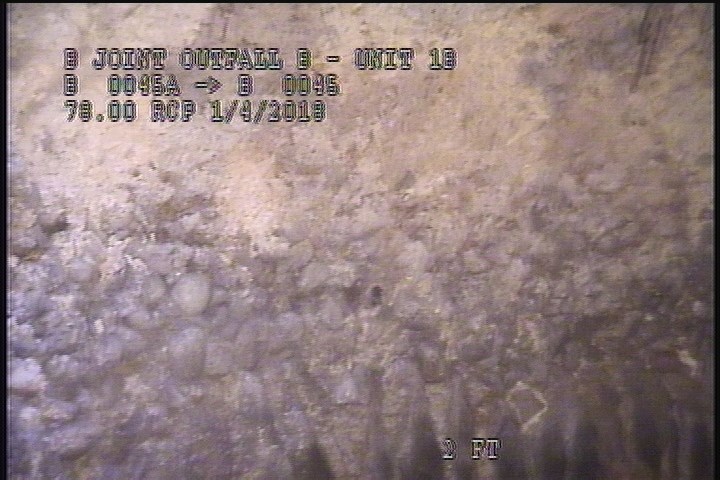 Surface Aggregate Projecting, from 08 to 04 o'clock, within 8 inches of joint: NO