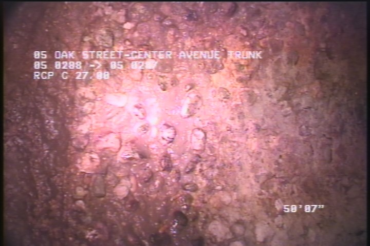 Surface Aggregate Projecting, from 08 to 04 o'clock, within 8 inches of joint: YES - SEVERE AGG