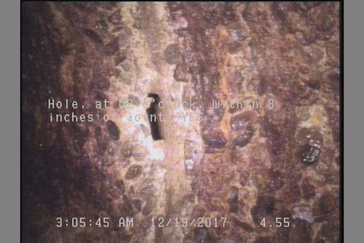 Hole, at 02 o'clock, within 8 inches of joint: YES