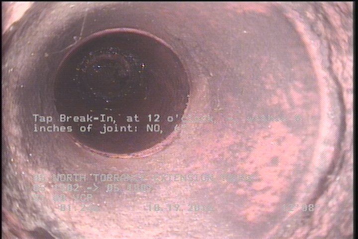 Tap Break-In, at 12 o'clock, -, within 8 inches of joint: NO, 6"