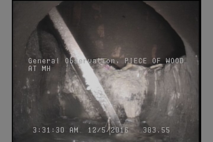 General Observation - PIECE OF WOOD AT MH