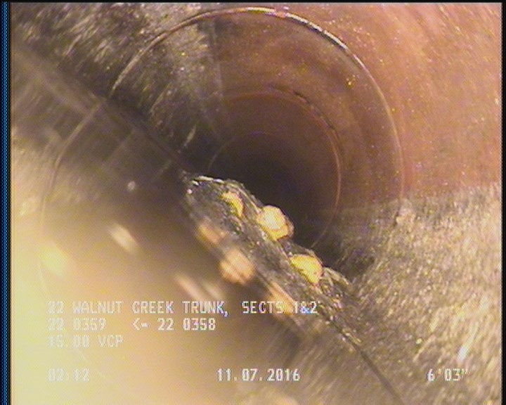 Deposits Settled Other, 25 %of cross sectional area, from 04 to 08 o'clock, , within 8 inches of joint: YES - DEBRIS