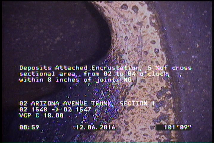 Deposits Attached Encrustation, 5 %of cross sectional area, from 02 to 04 o'clock, , within 8 inches of joint: NO