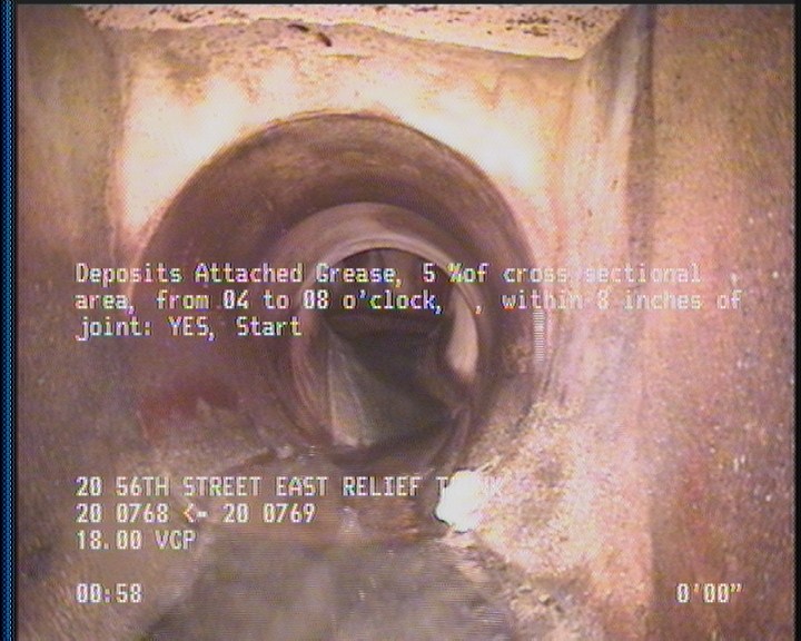 Deposits Attached Grease, 5 %of cross sectional area, from 04 to 08 o'clock, , within 8 inches of joint: YES
