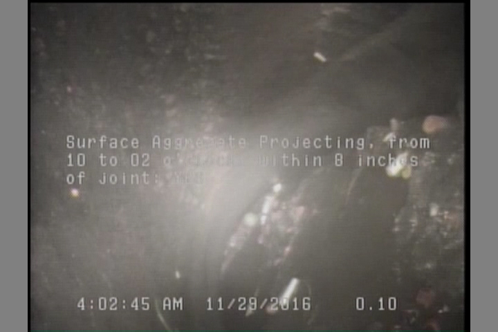 Surface Aggregate Projecting, from 10 to 02 o'clock, within 8 inches of joint: YES