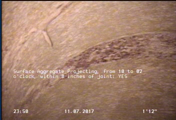 Surface Aggregate Projecting, from 10 to 02 o'clock, within 8 inches of joint: YES