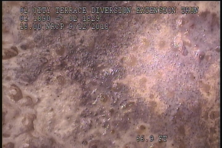 Surface Spalling, from 11 to 01 o'clock, within 8 inches of joint: NO - ROUGH TEXTURED CONCRETE UNDER MAG COAT