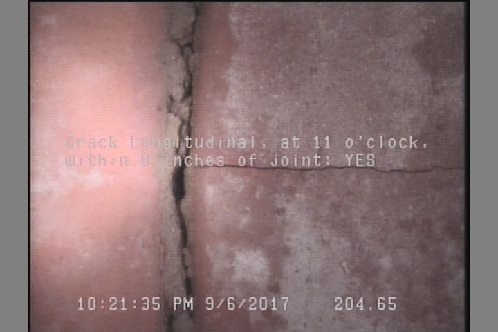 Crack Longitudinal, at 11 o'clock, within 8 inches of joint: YES