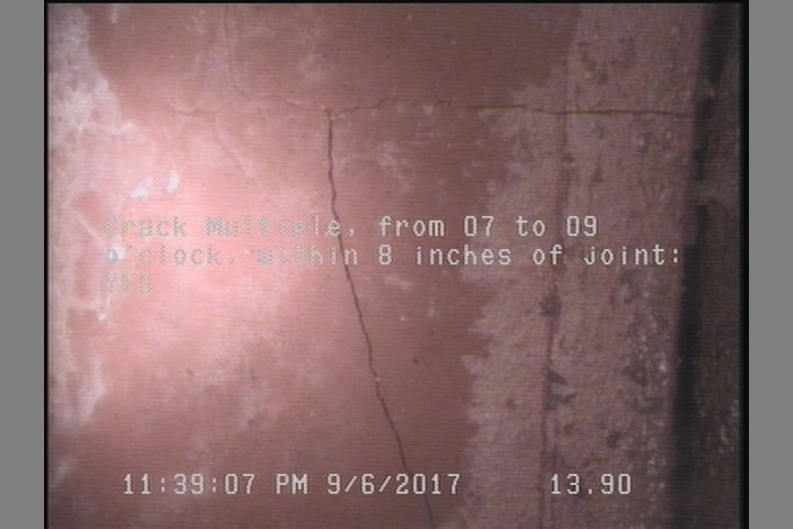 Crack Multiple, from 07 to 09 o'clock, within 8 inches of joint: YES