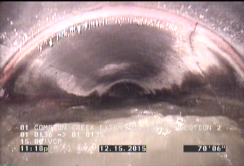 Crack Spiral, from 01 to 03 o'clock, within 8 inches of joint: YES