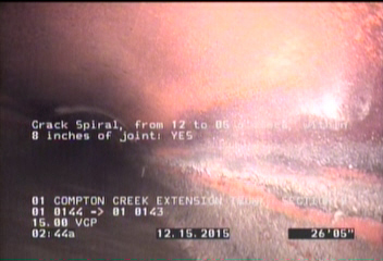 Crack Spiral, from 12 to 05 o'clock, within 8 inches of joint: YES