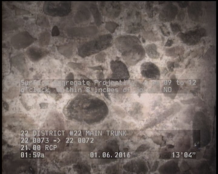 Surface Aggregate Projecting, from 09 to 12 o'clock, within 8 inches of joint: NO