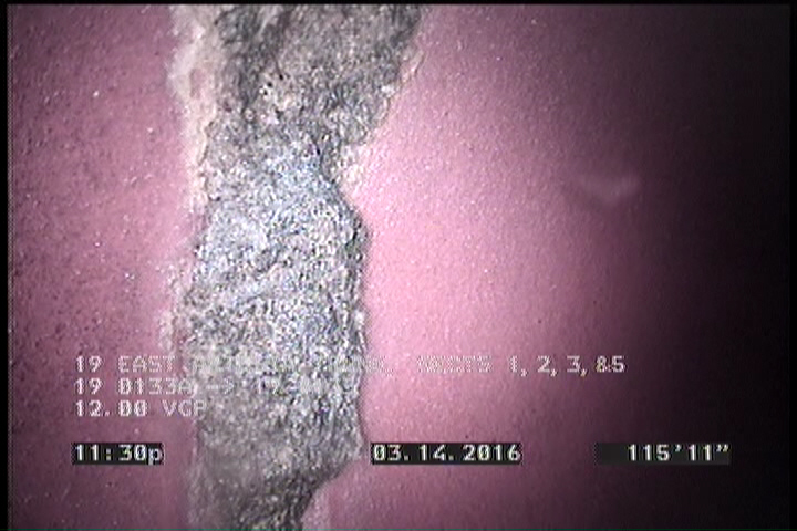 Deposits Attached Encrustation, 5 %of cross sectional area, from 08 to 04 o'clock, , within 8 inches of joint: YES