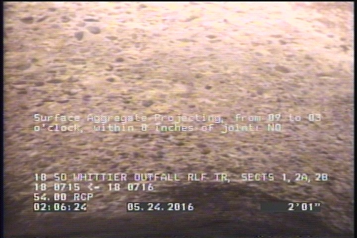 Surface Aggregate Projecting, from 09 to 03 o'clock, within 8 inches of joint: NO