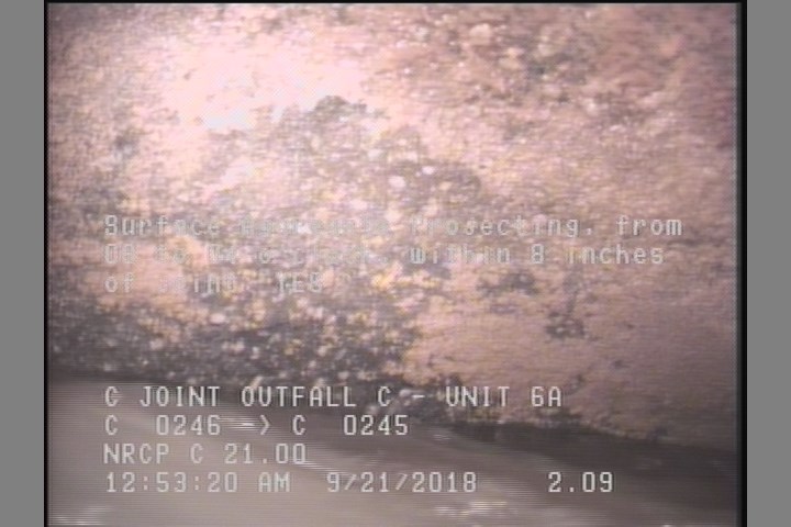 Surface Aggregate Projecting, from 08 to 04 o'clock, within 8 inches of joint: YES