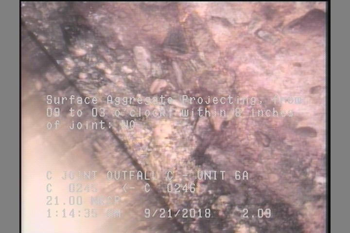 Surface Aggregate Projecting, from 09 to 03 o'clock, within 8 inches of joint: NO