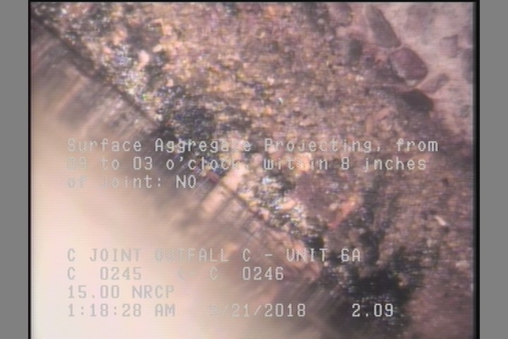 Surface Aggregate Projecting, from 09 to 03 o'clock, within 8 inches of joint: NO