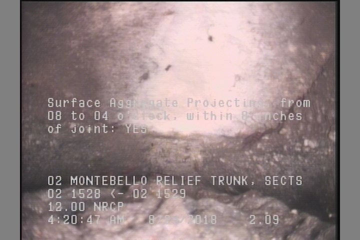 Surface Aggregate Projecting, from 08 to 04 o'clock, within 8 inches of joint: YES