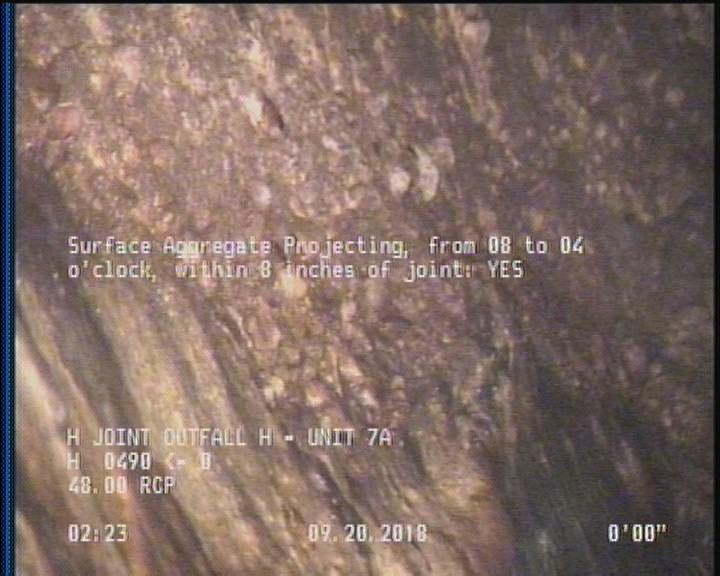 Surface Aggregate Projecting, from 08 to 04 o'clock, within 8 inches of joint: YES