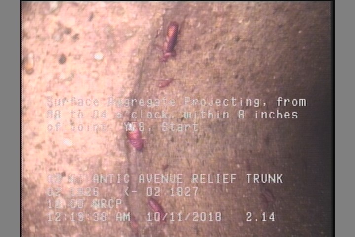 Surface Aggregate Projecting, from 08 to 04 o'clock, within 8 inches of joint: YES, Start