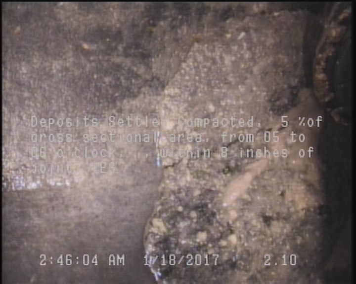 Deposits Settled Compacted, 5 %of cross sectional area, from 05 to 06 o'clock, , within 8 inches of joint: YES