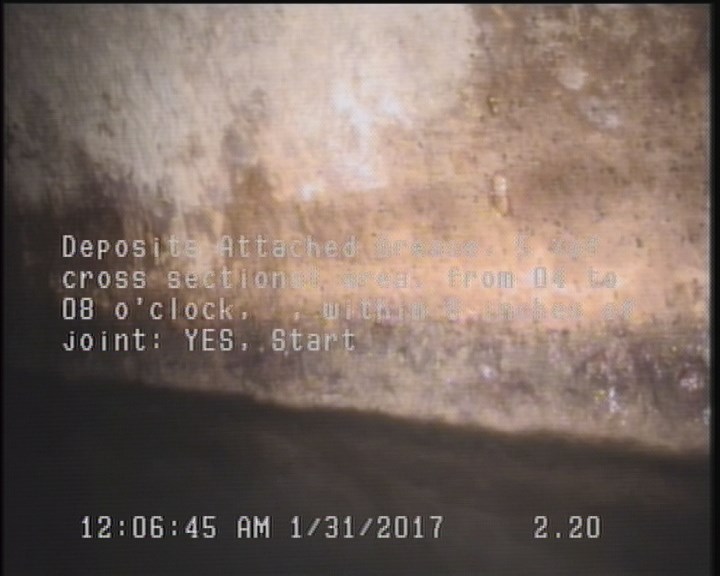 Deposits Attached Grease, 5 %of cross sectional area, from 04 to 08 o'clock, , within 8 inches of joint: YES, Start