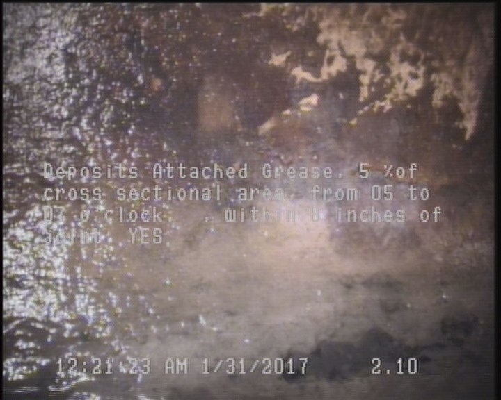 Deposits Attached Grease, 5 %of cross sectional area, from 05 to 07 o'clock, , within 8 inches of joint: YES