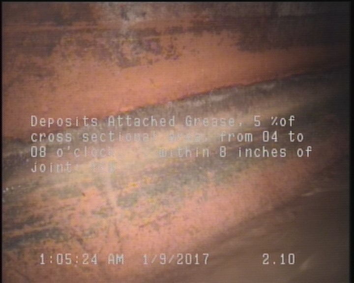 Deposits Attached Grease, 5 %of cross sectional area, from 04 to 08 o'clock, , within 8 inches of joint: YES