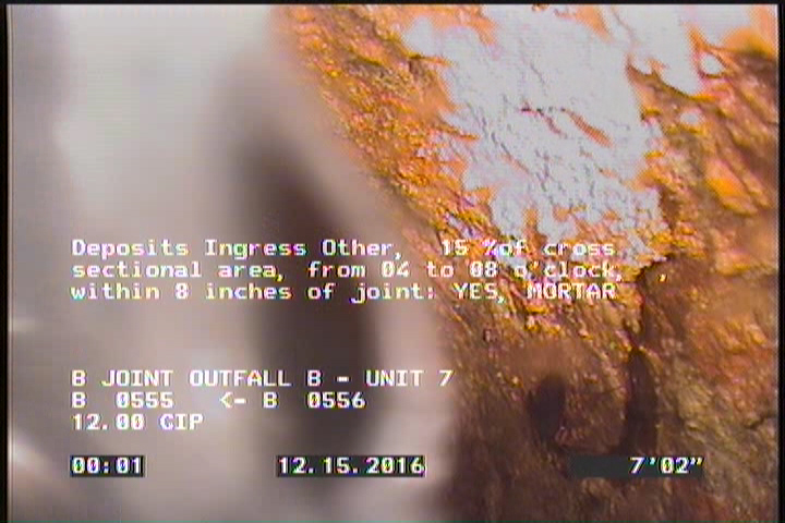 Deposits Ingress Other, 15 %of cross sectional area, from 04 to 08 o'clock, , within 8 inches of joint: YES - MORTAR