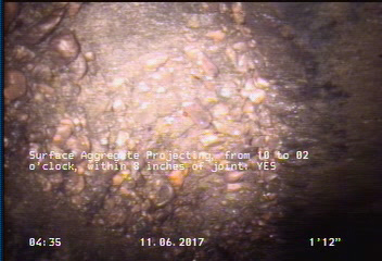 Surface Aggregate Projecting, from 10 to 02 o'clock, within 8 inches of joint: YES