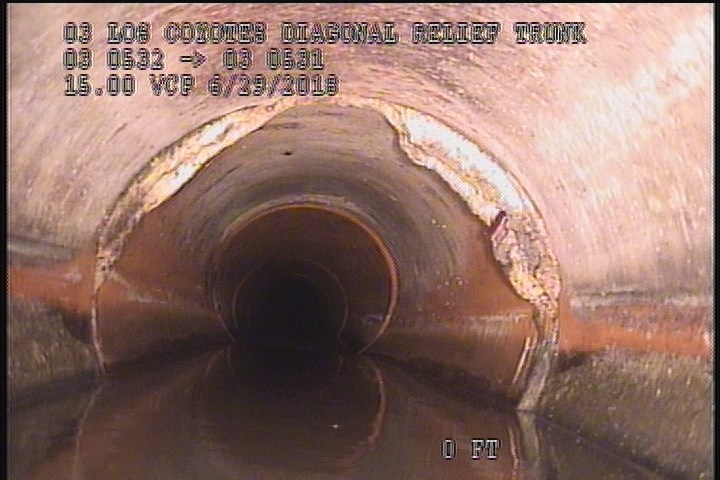 Deposits Attached Encrustation, 25 %of cross sectional area, from 07 to 05 o'clock, , within 8 inches of joint: YES