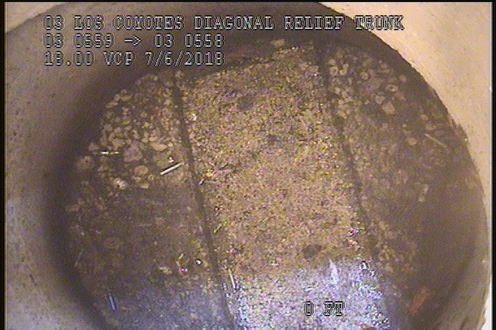 Deposits Settled Other, 95 %of cross sectional area, from 01 to 11 o'clock, , within 8 inches of joint: NO - FLOATING SLUDGE