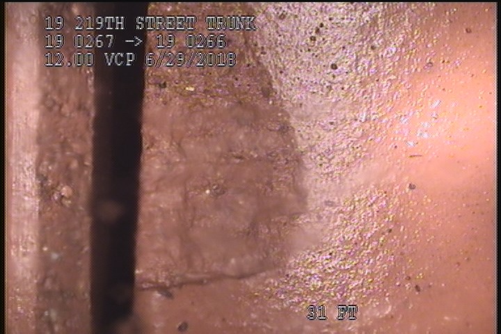 Surface Spalling, at 12 o'clock, within 8 inches of joint: YES